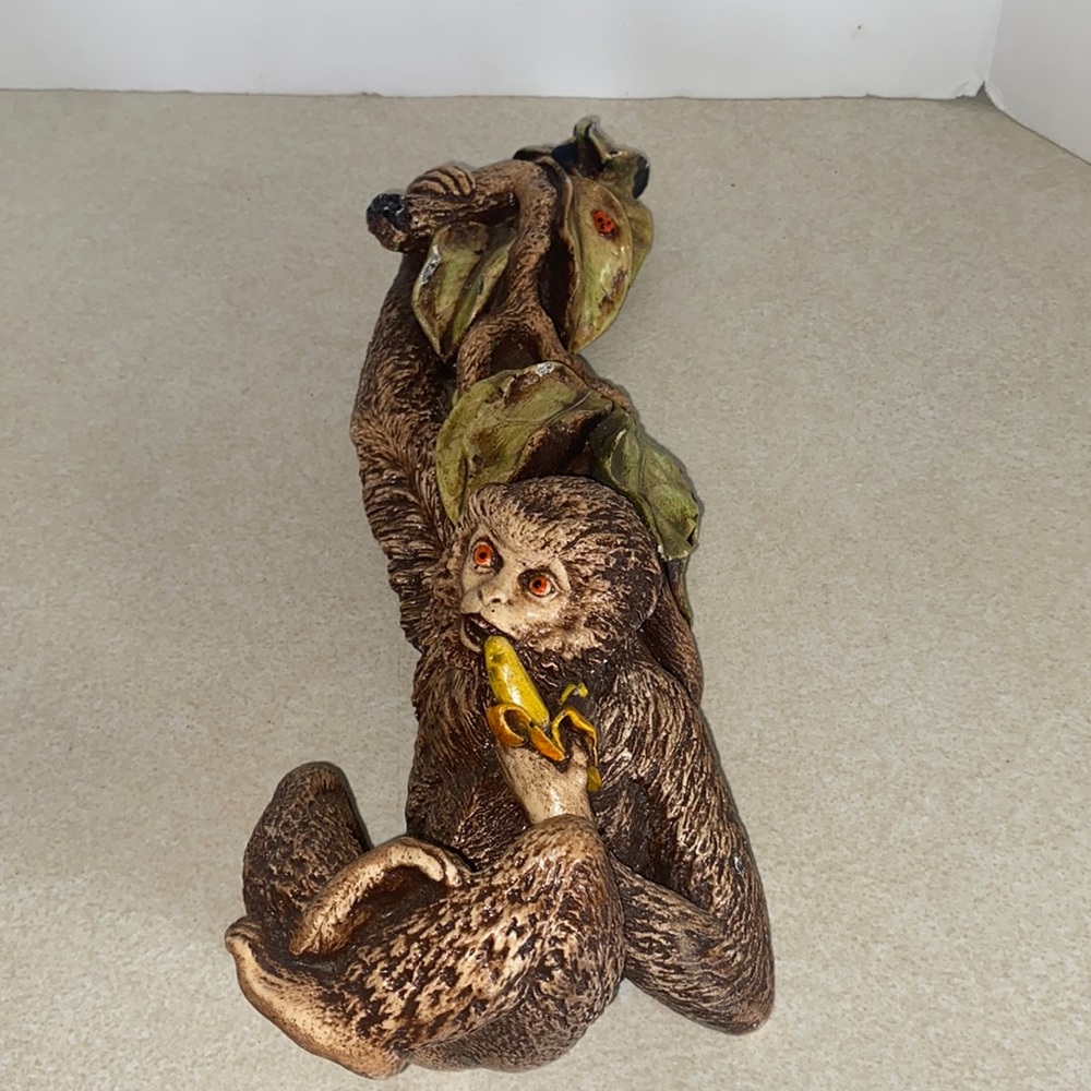 Vintage plaster mid-century modern monkey on vine eating banana wall hanging